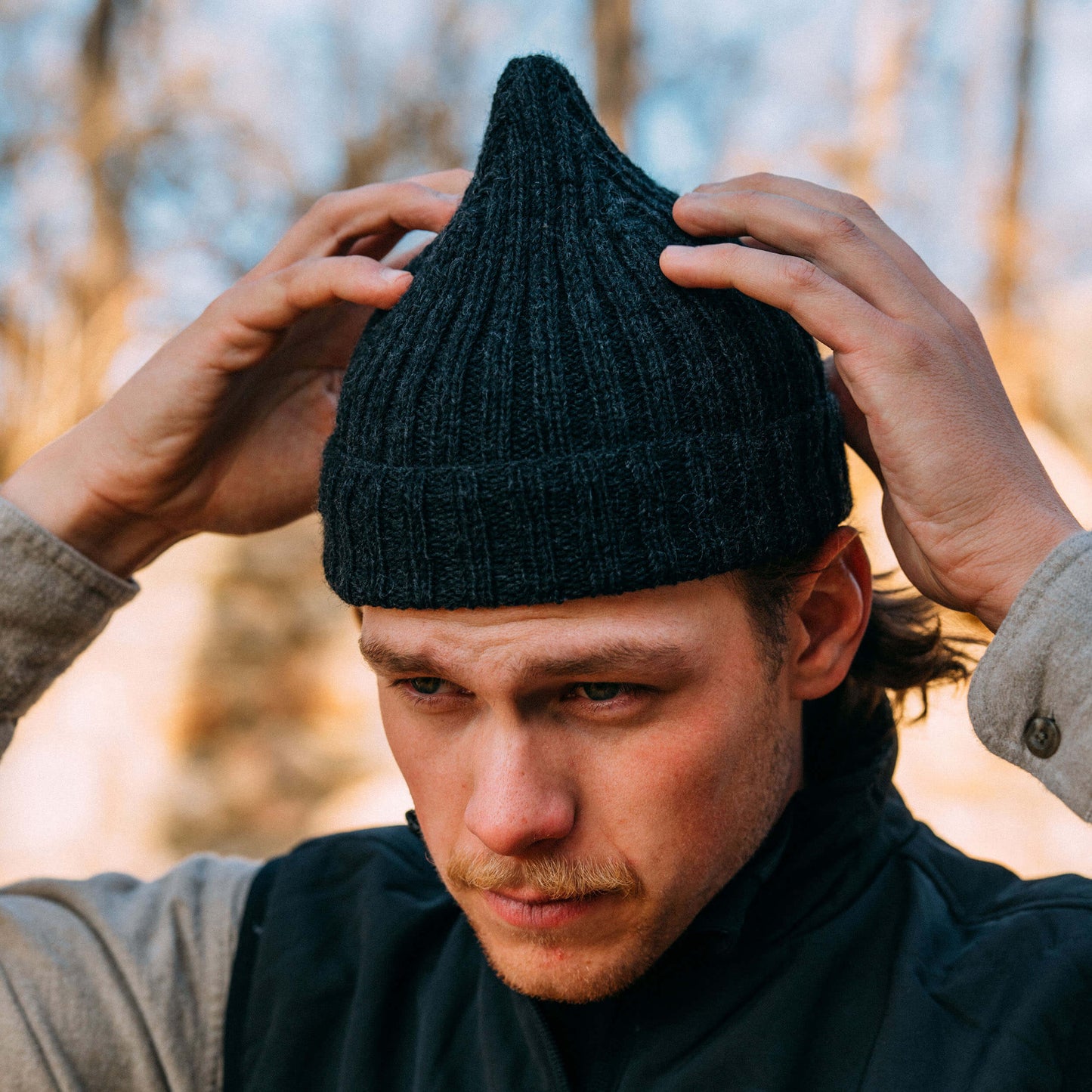 Hand knit pointy wool beanie hat — charcoal