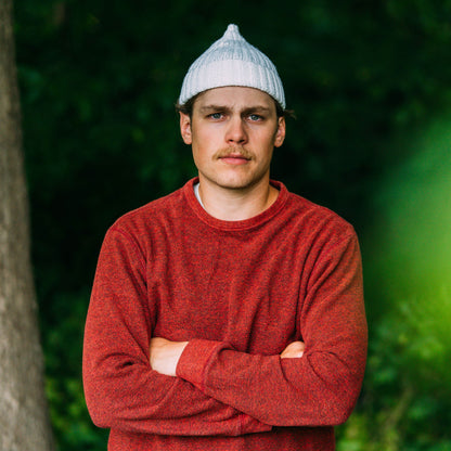 Hand knit pointy wool beanie, white, portrait