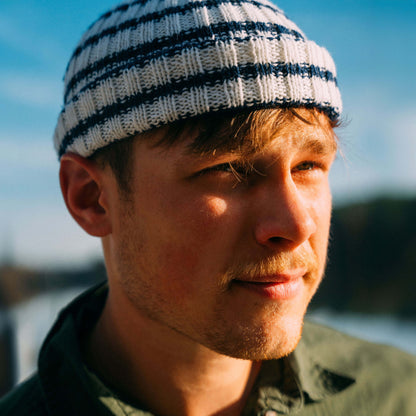 White and navy striped wool beanie, close up