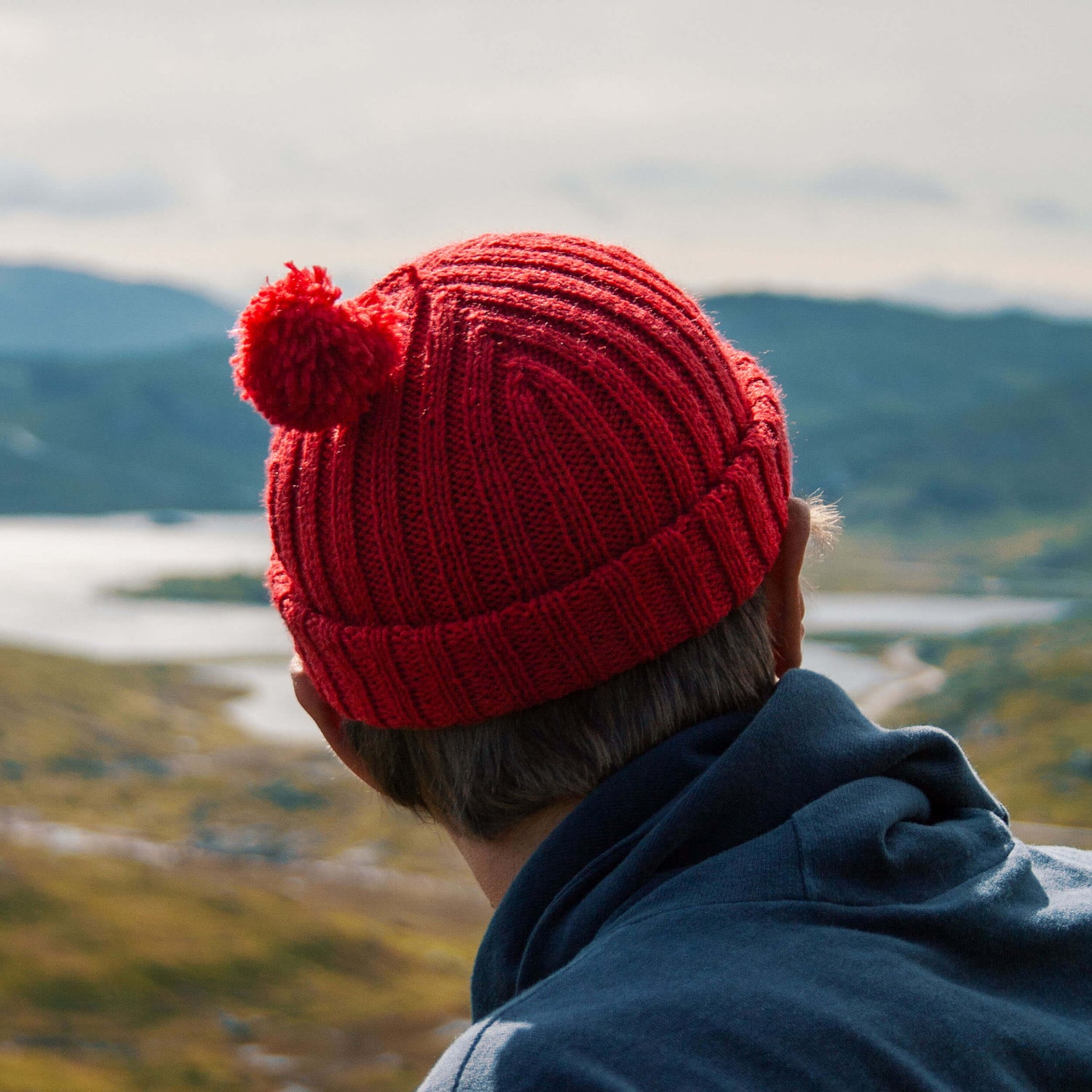 Wool beanie with pom-pom, red, back view